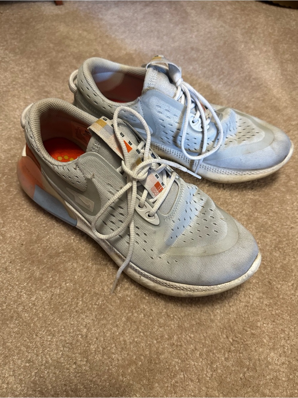 Light Gray Nike Athletic Sneakers with Orange Accent. Size 9